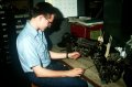 radioman-2nd-class-lindely-repairs-a-teletype-machine-in-the-maintenance-department-67891b.jpg