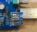 Photo of 3 blue LEDs and IR sensor with a ruler indicating ~4mm difference.