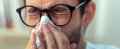 ManSneezing-600x243.jpg