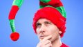 ManDressedInElfHat-600x338.jpg
